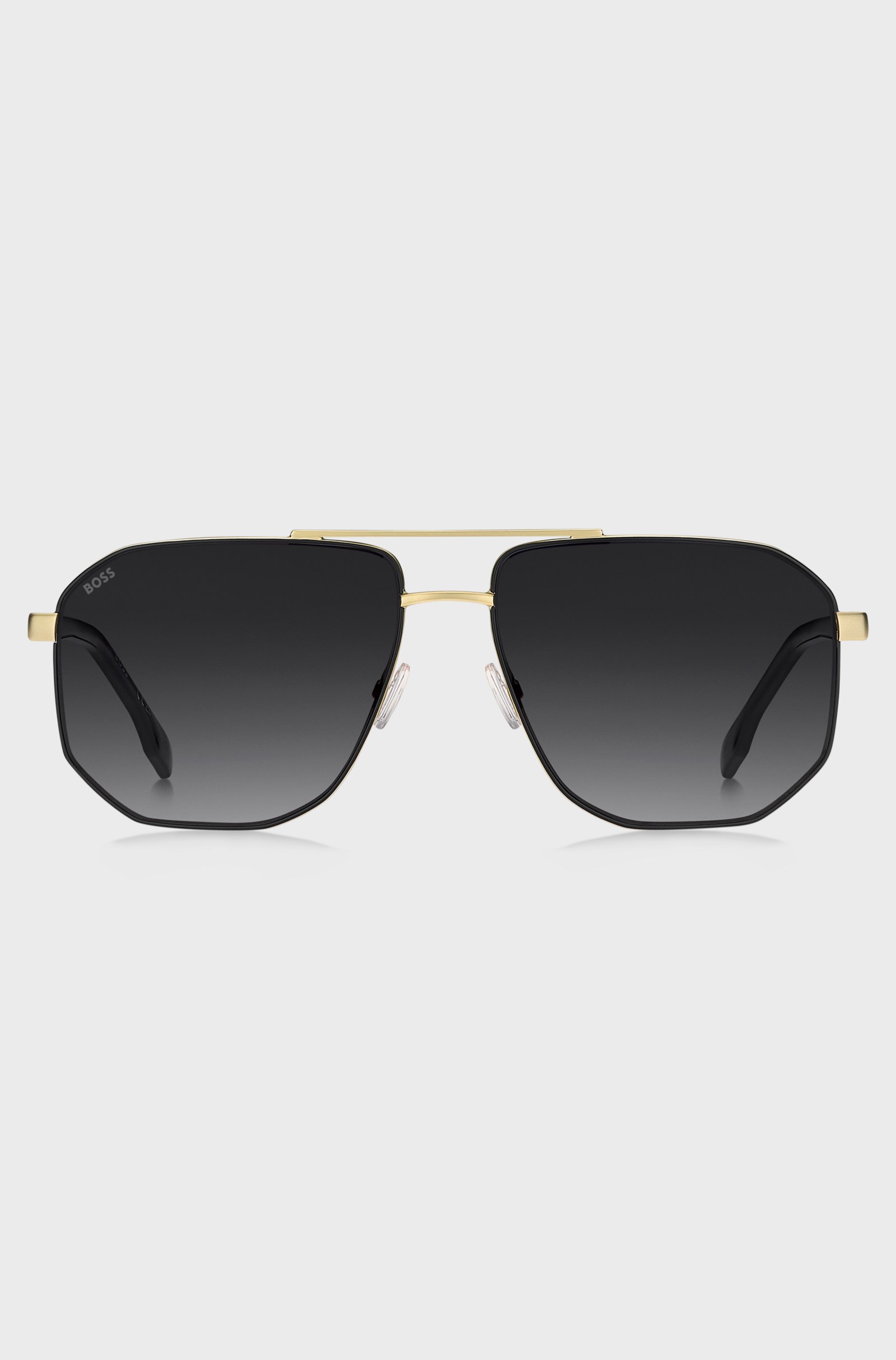 Lunettes de soleil ton doré avec bordures noires